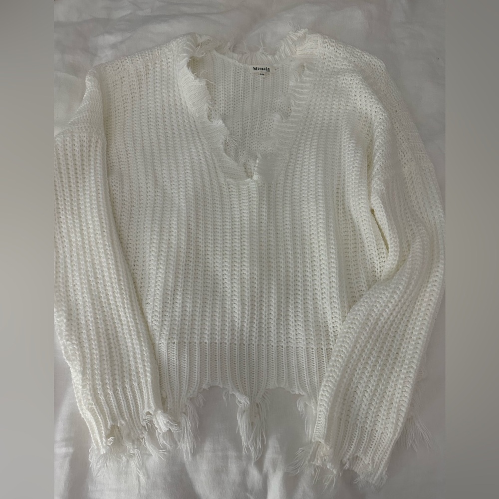 White distressed knit sweater